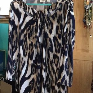 Navy/Cream/Gray blouse with swirly design.